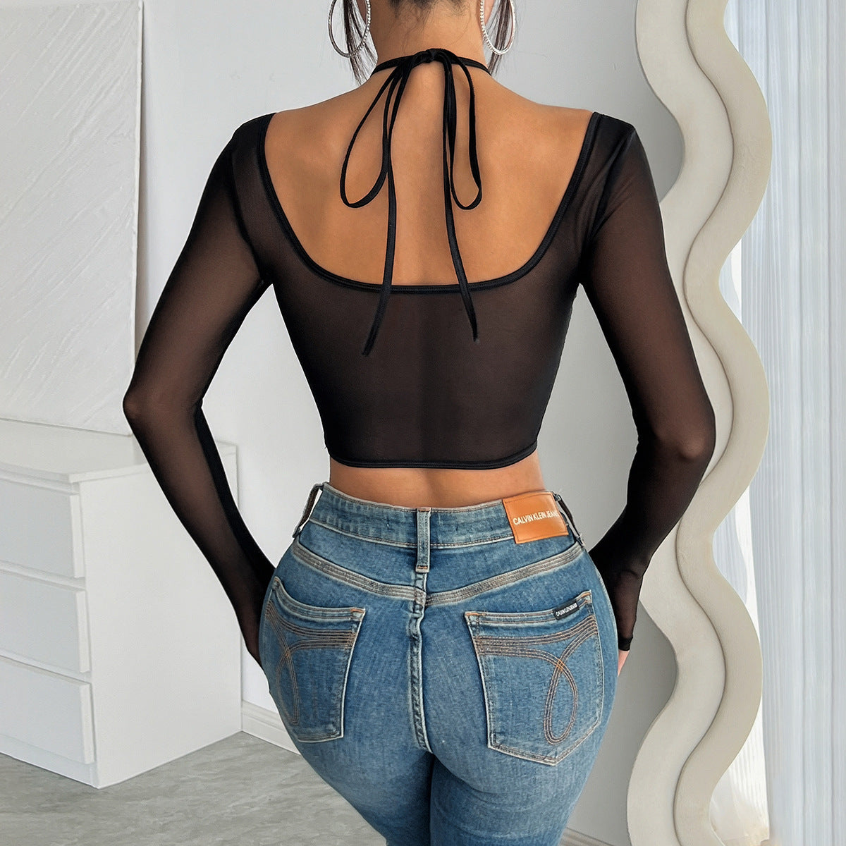 Black sheer mesh long-sleeved crop top with tie neck detail for fashionable langry ملابس