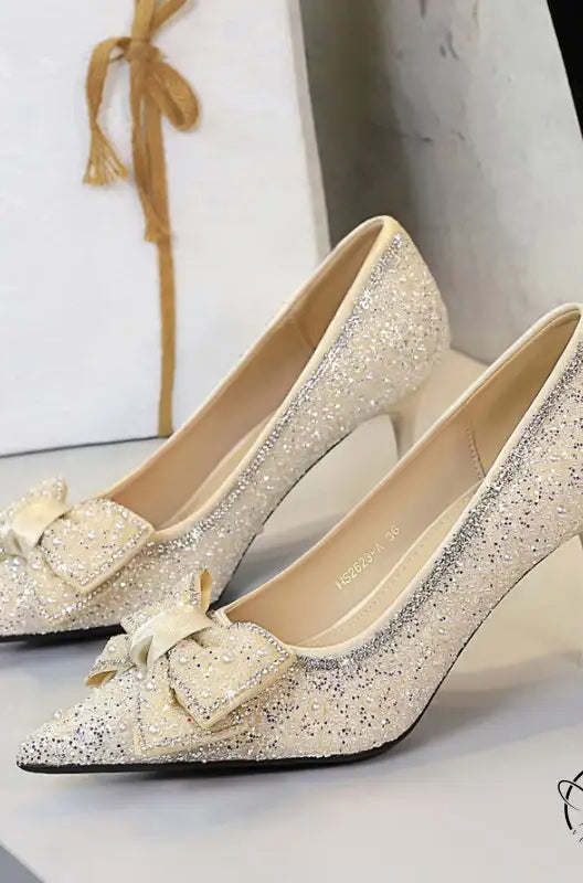 Glittery gold langry fashion stiletto pumps with bowknot rhinestone details