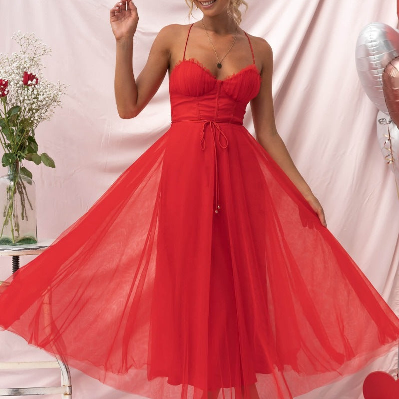 Elegant sling dress in red chiffon showcasing a sexy sling dress style for evening events