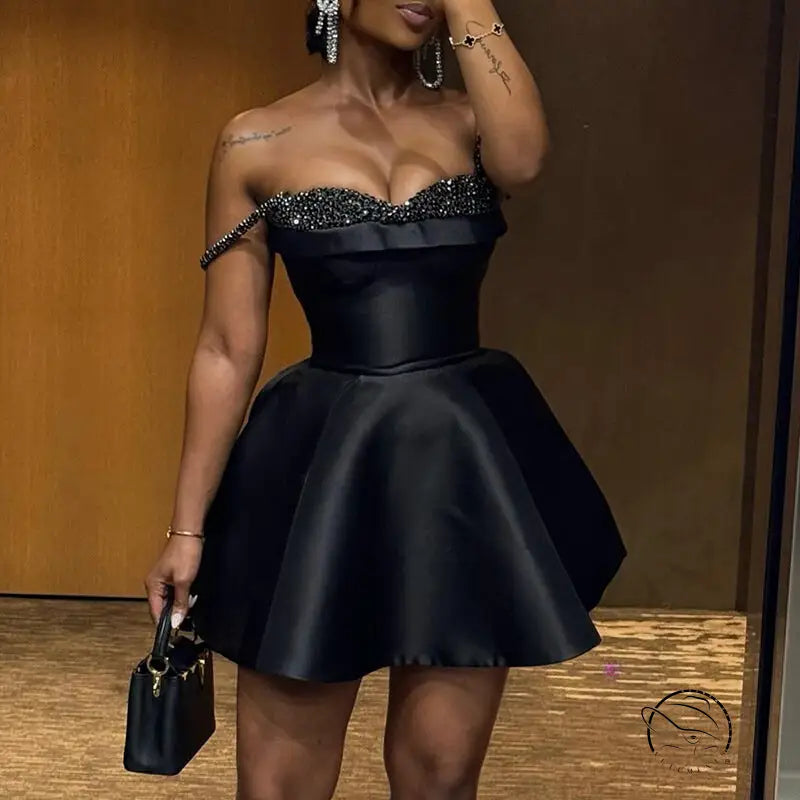 Elegant langry black off-shoulder fashion dress with beaded trim and flared skirt