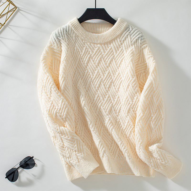 Cream cable knit crew neck sweater with textured pattern and long sleeves