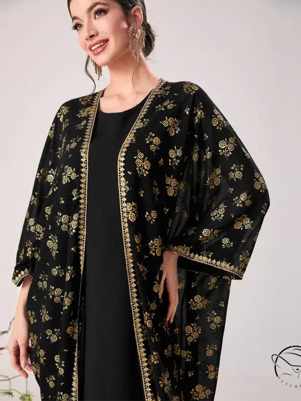 Elegant black floral kimono with gold accents in langry fashion ملابس