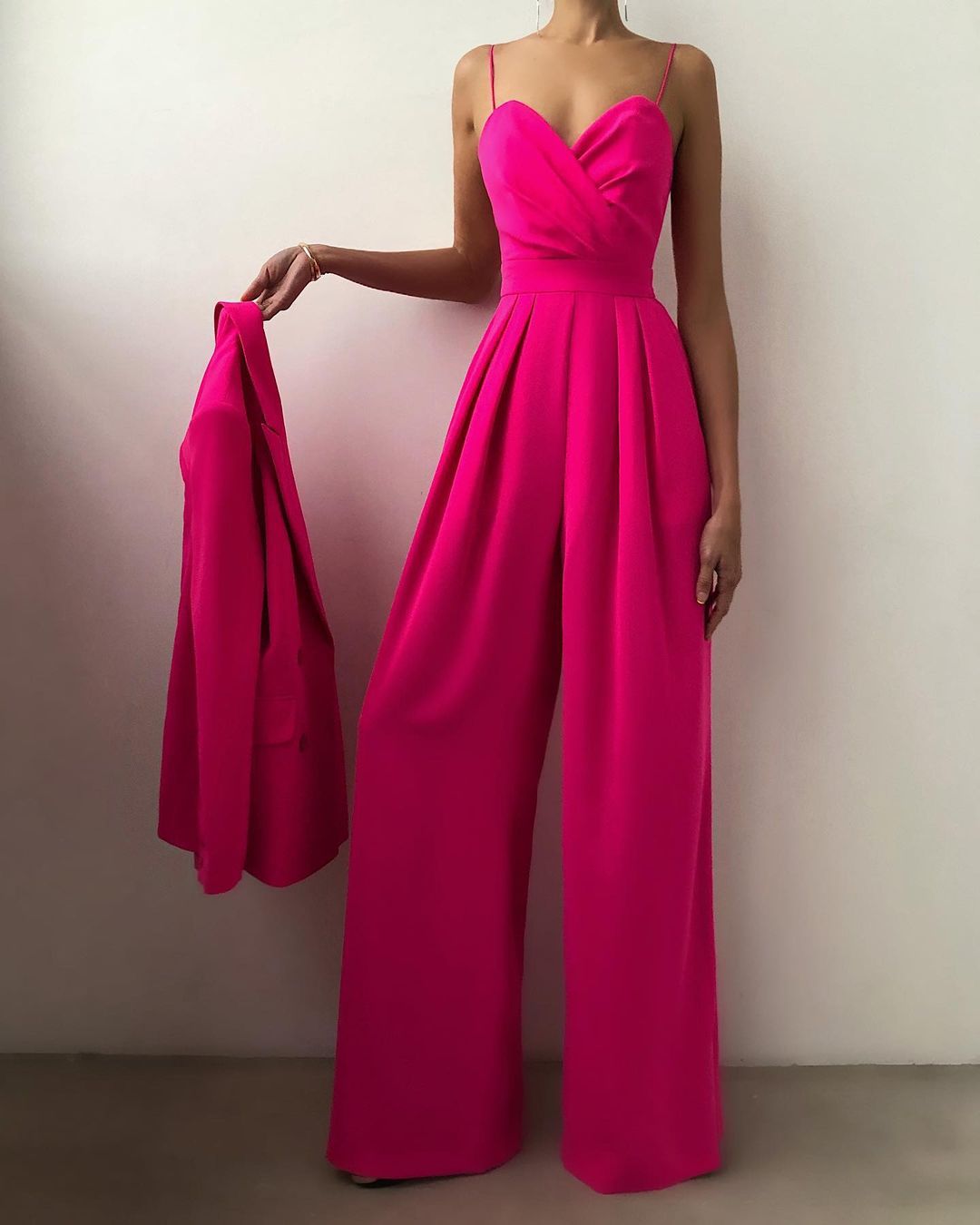 Hot pink strapless jumpsuit with wide-leg pants, a perfect addition to modern fashion ملابس
