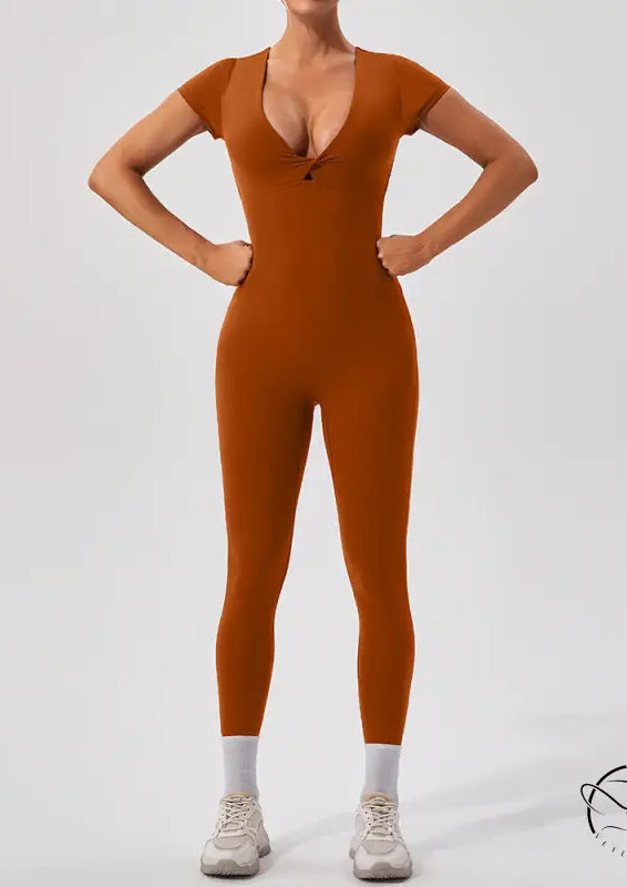 Sleek rust-orange langry fashion yoga bodysuit with v-neck
