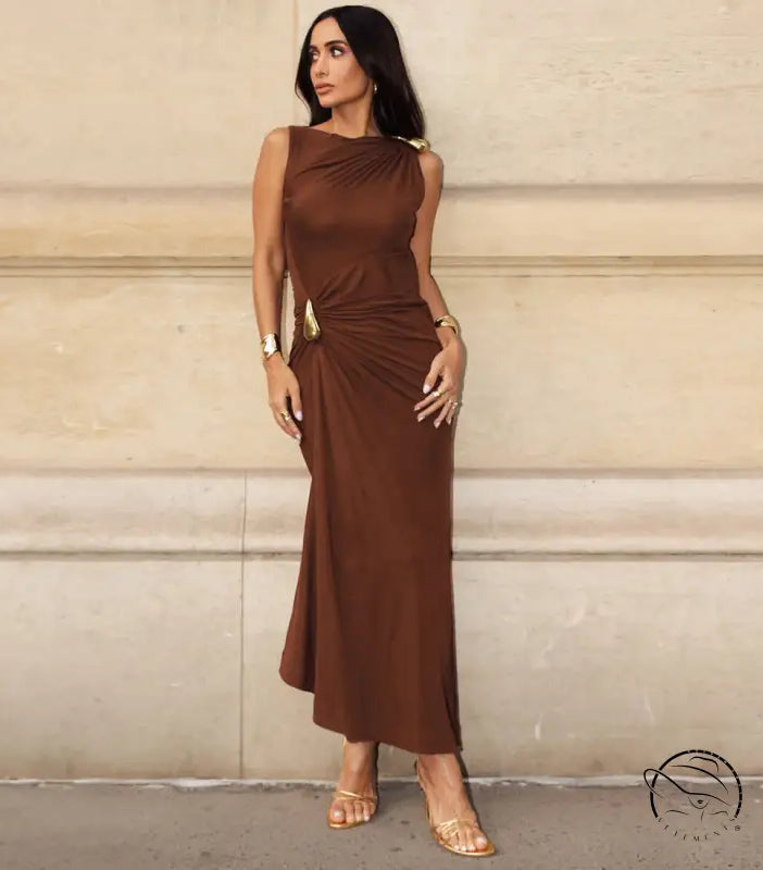 Elegant slim sheath sleeveless dress in brown satin with gold embellishments and high heels
