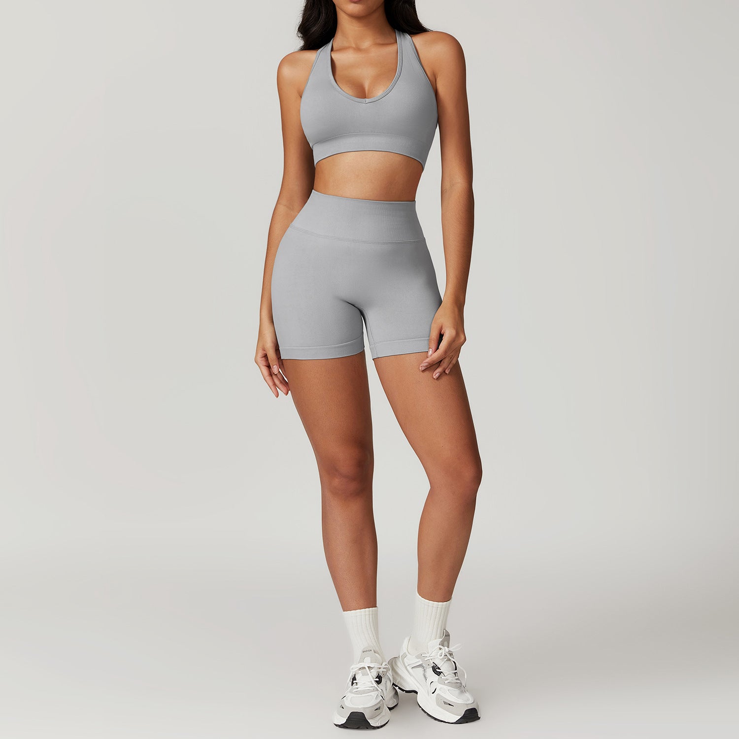 Gray Seamless Yoga Suit featuring a stylish bra and shorts set, ideal for active wear