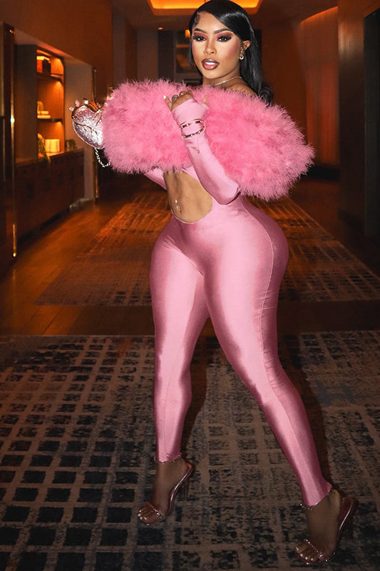 Pink feathered glove with metallic accents in long sleeve fashion jumpsuit
