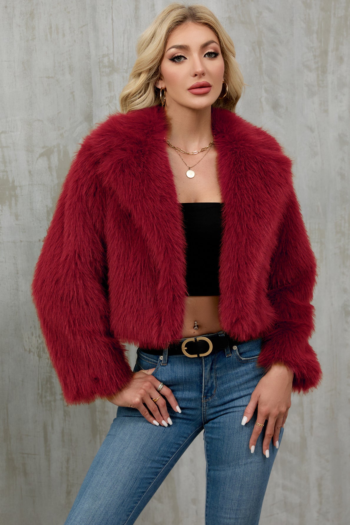 Vibrant red faux fur cropped jacket with fluffy texture and wide collar