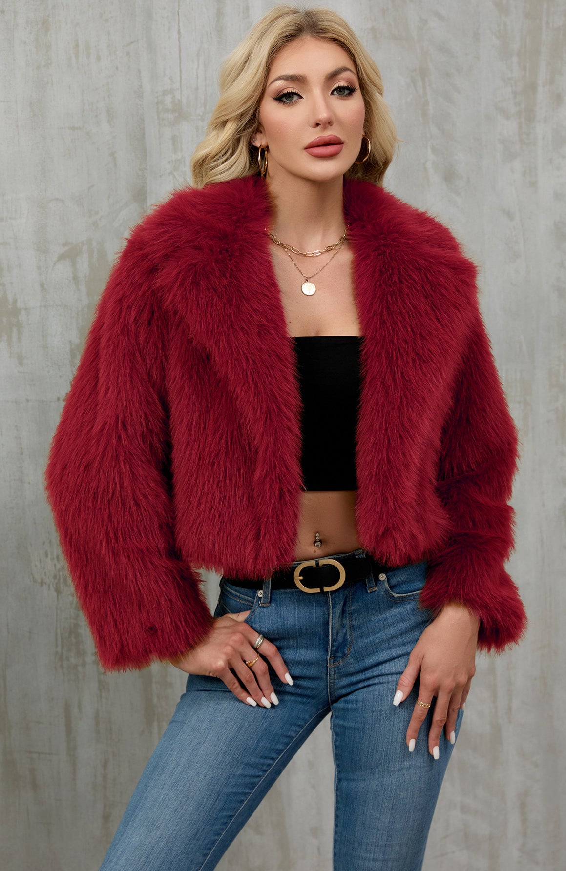Vibrant red faux fur cropped jacket with fluffy texture and wide collar