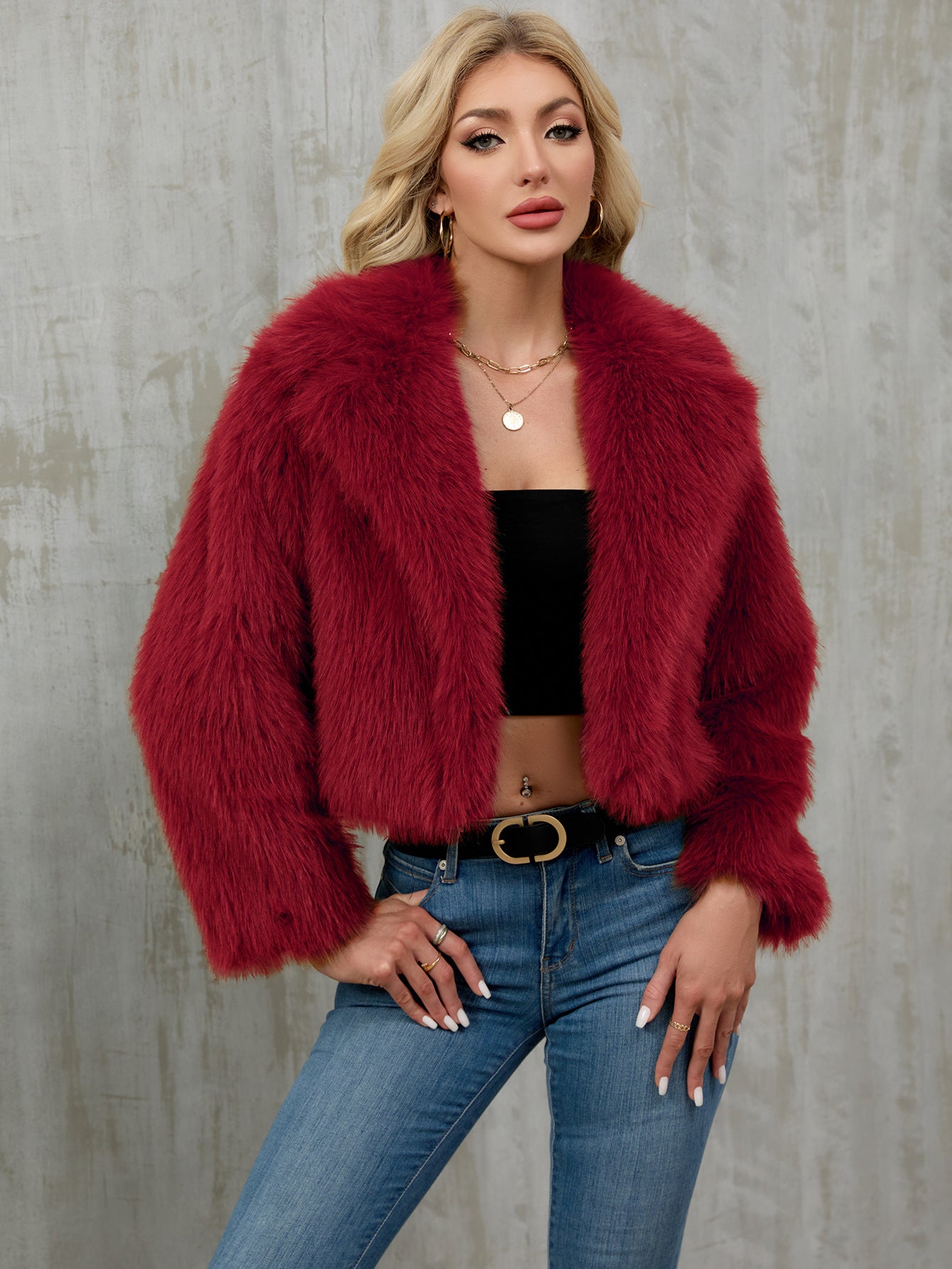 Vibrant red faux fur cropped jacket with fluffy texture and wide collar