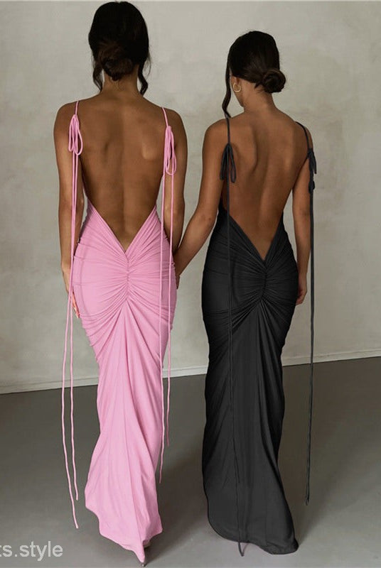 Two elegant slim fit sheath dresses showcasing backless, draped designs for evening wear