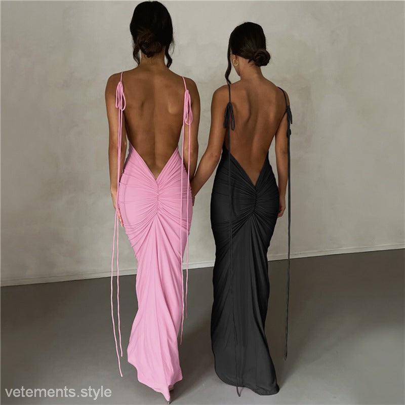 Two elegant slim fit sheath dresses showcasing backless, draped designs for evening wear