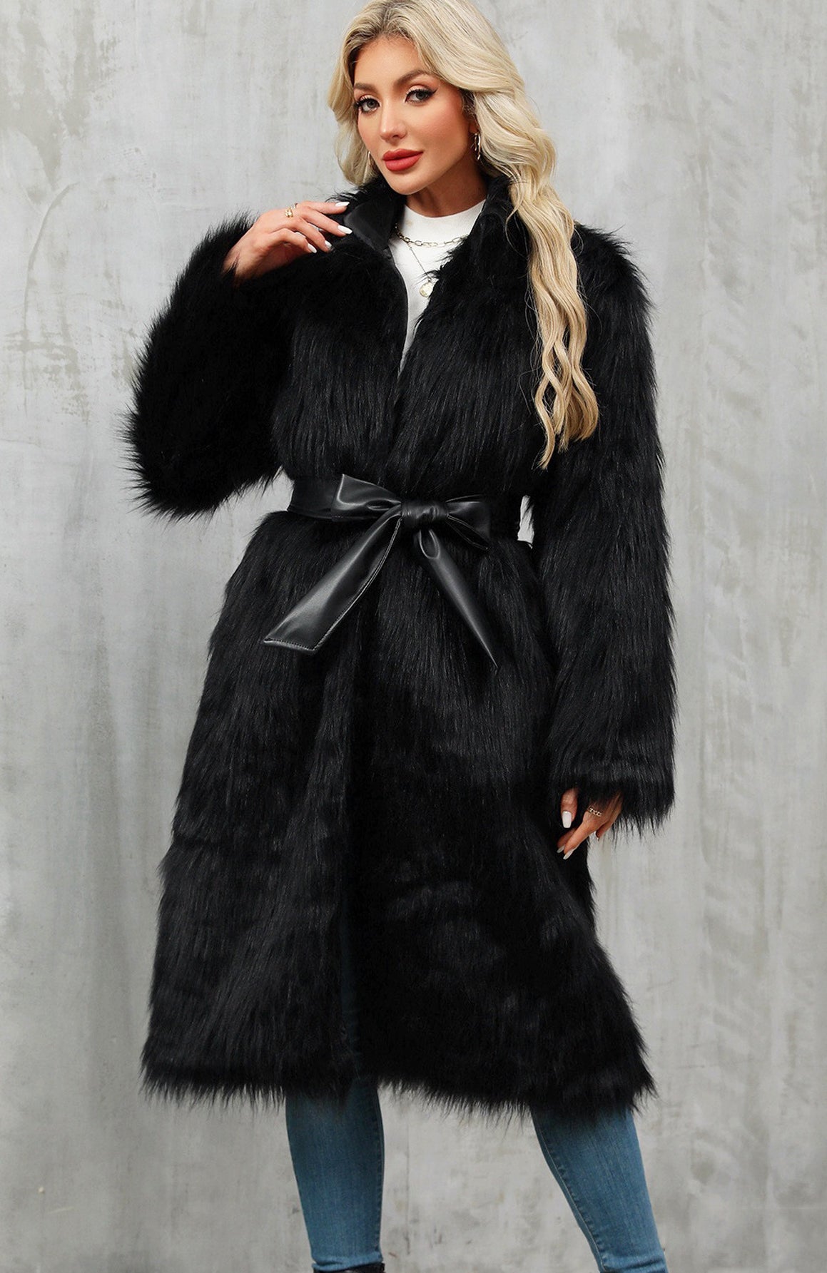 Long faux fur overknee coat in black with bow belt