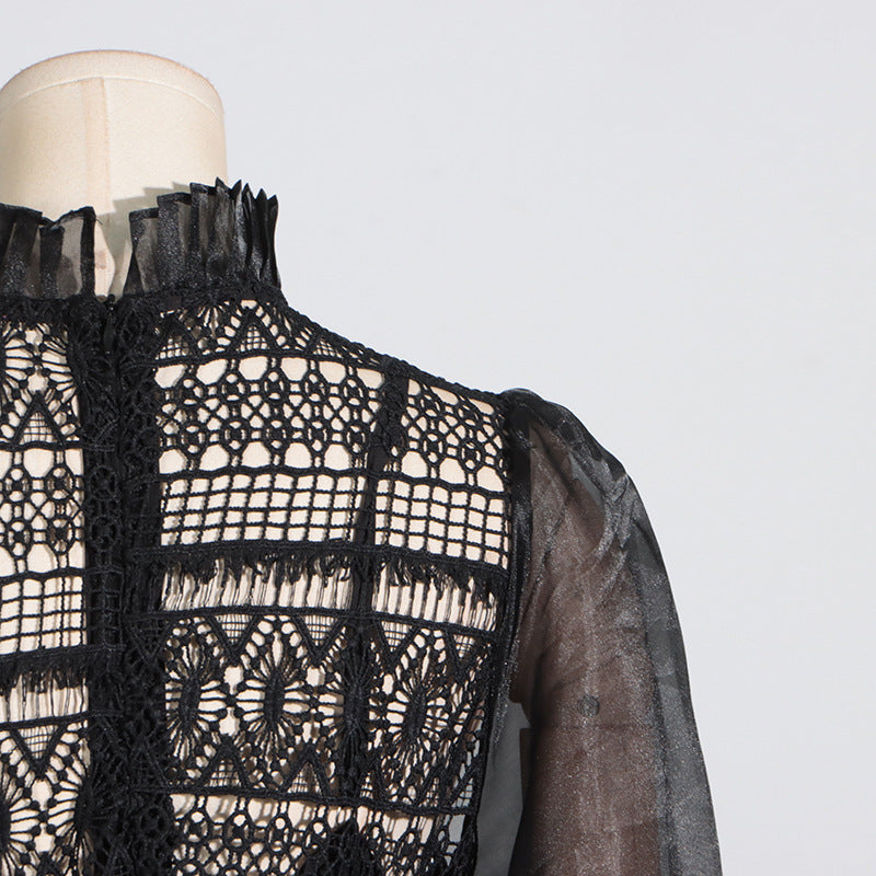 Black lace high-neck blouse featuring elegant lantern sleeves in fashion-forward design
