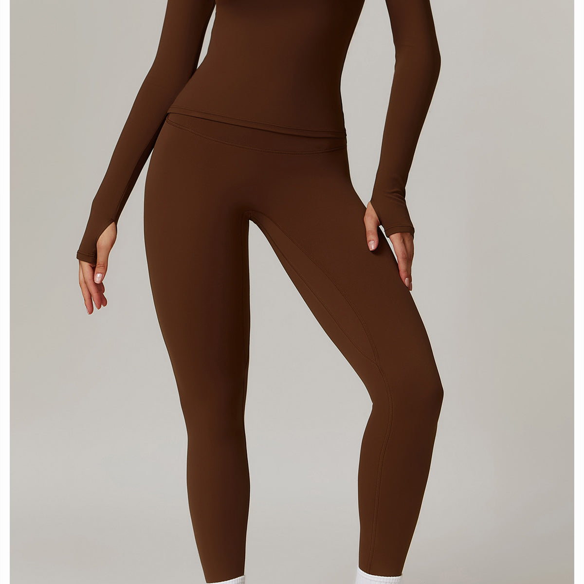 Brown long-sleeved athletic jumpsuit with white socks and sneakers for Outdoor Running Fitness
