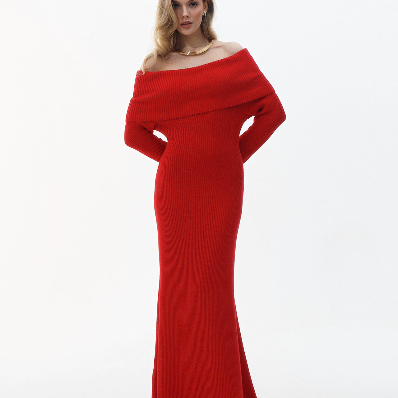 Elegant red off-the-shoulder formal dress showcasing sophisticated fashion and ملابس style