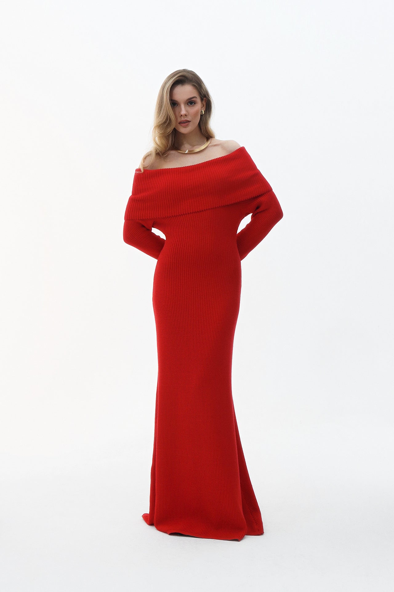 Elegant red off-the-shoulder formal dress showcasing sophisticated fashion and ملابس style