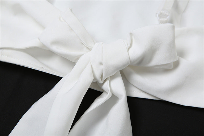 White fabric tied in a knot on a Summer Women Wear Camisole Knotted Short Top set