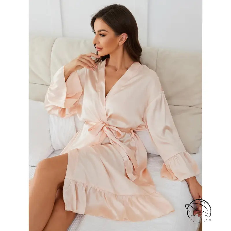 Light pink satin long sleeve robe with tie waist and ruffled hem
