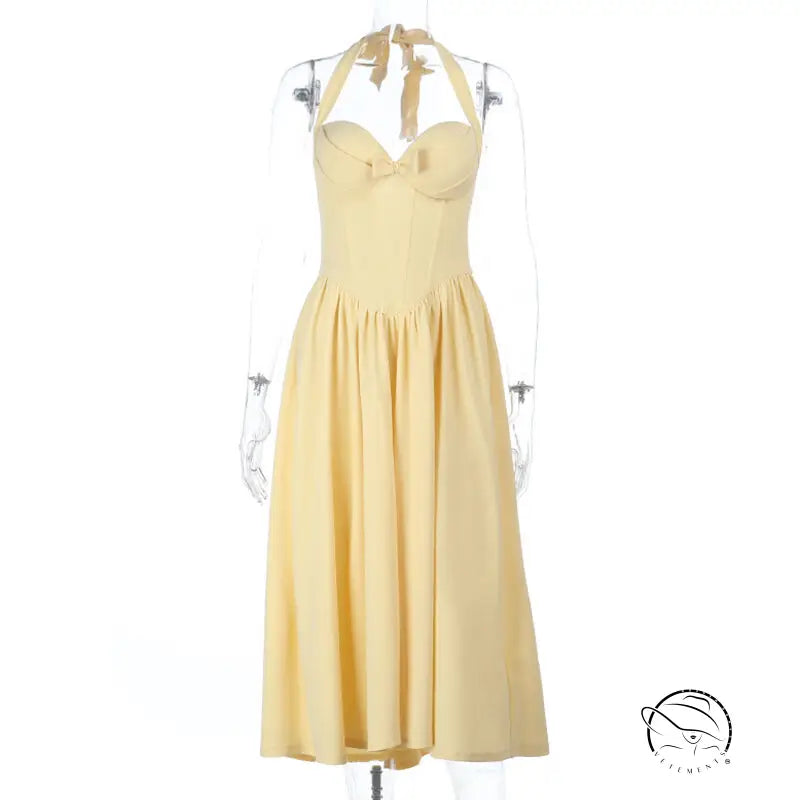 Yellow halter neck langry fashion dress with sweetheart neckline and pleated skirt