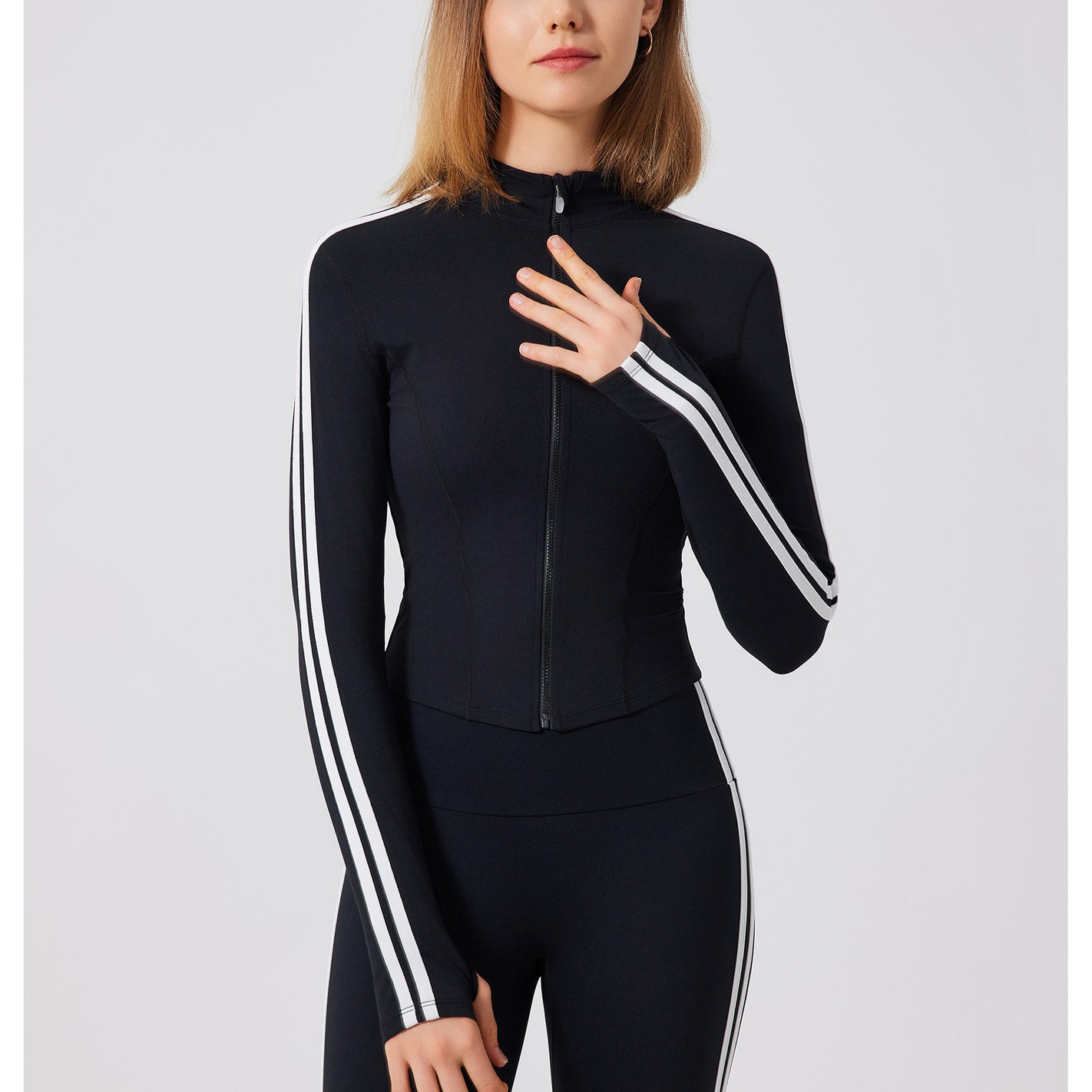 Black Adidas tracksuit in running skin friendly fitness top with white stripes and zipper