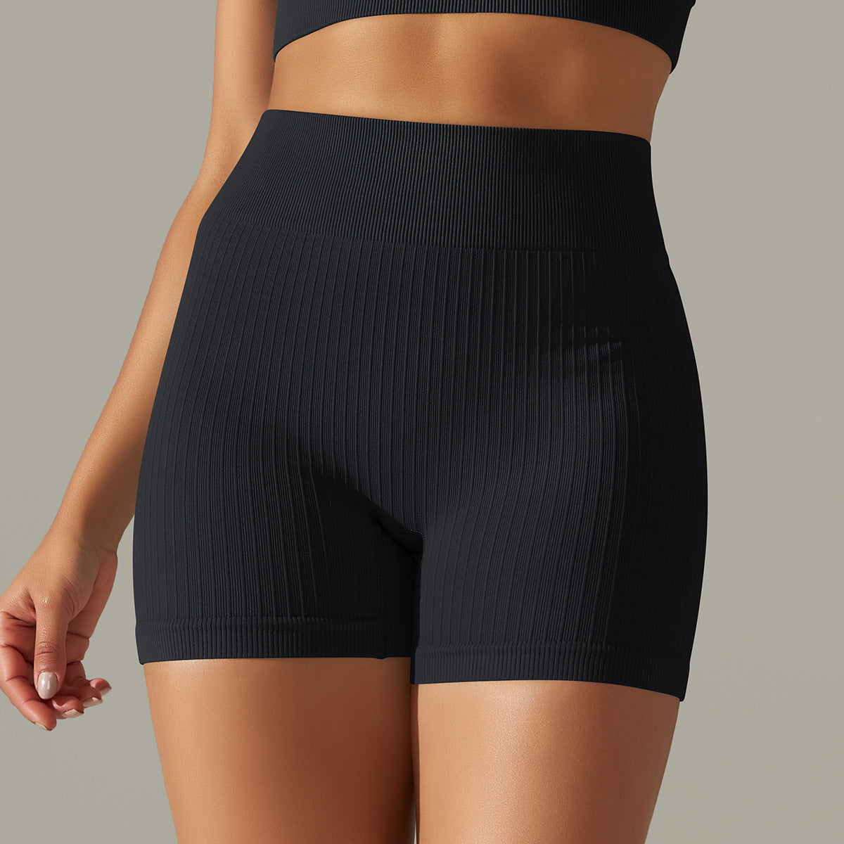 Black ribbed high-waisted shorts from Seamless Striped Peach Hip collection for yoga and fitness