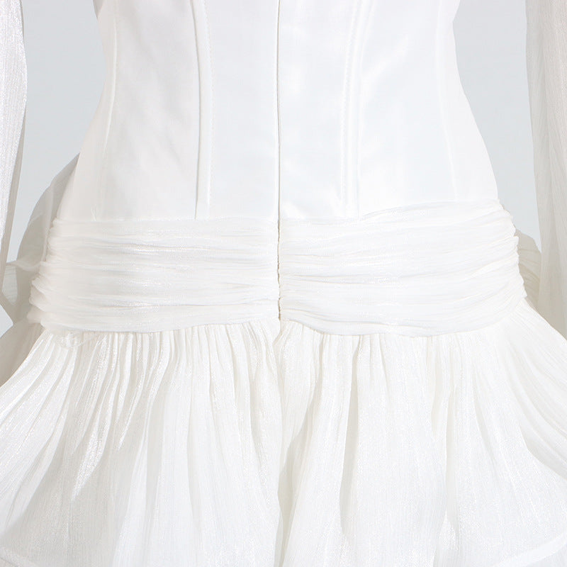 White langry cotton summer dress with ruffled hem and back zipper