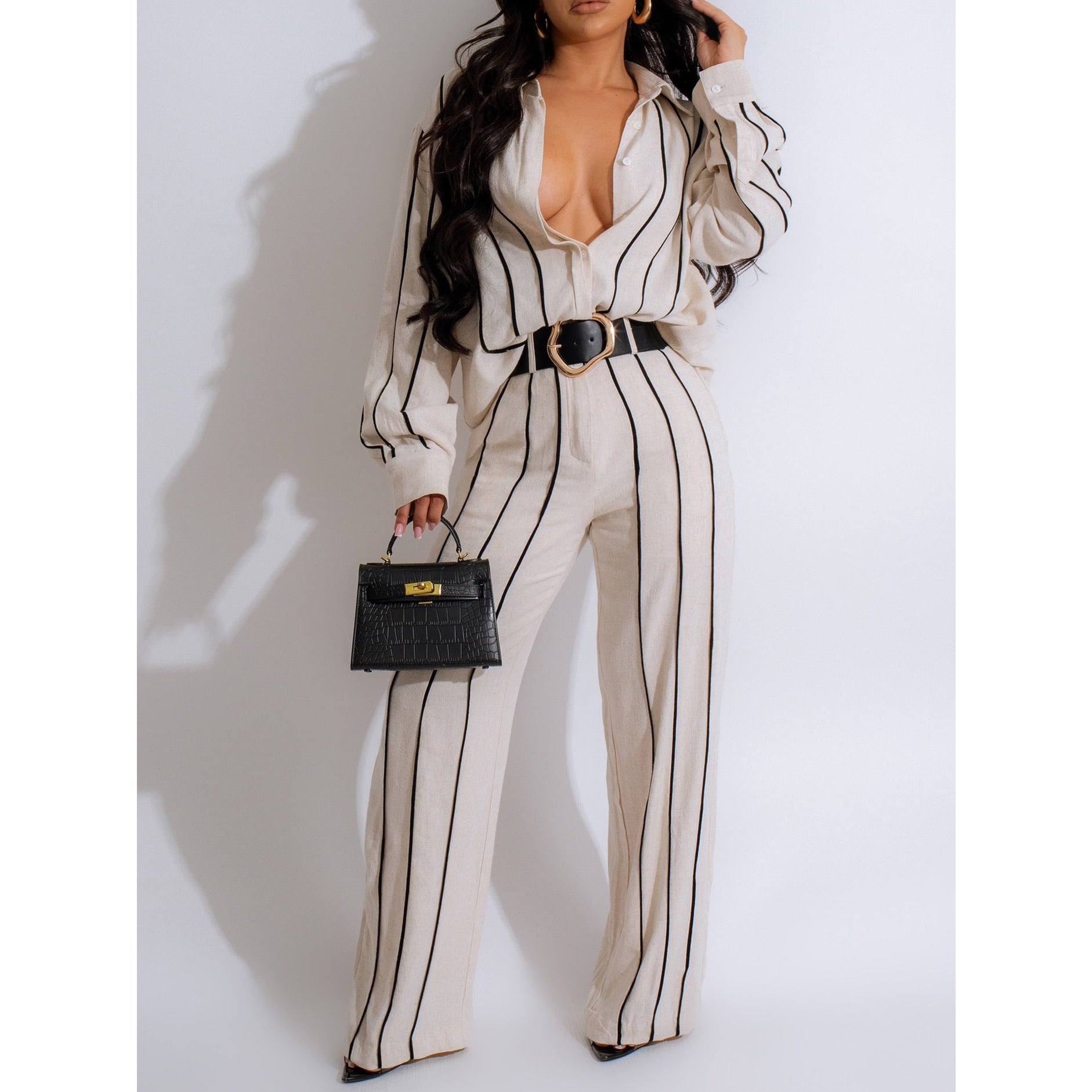 Striped black and white jumpsuit in enchanting langry fashion ملابس