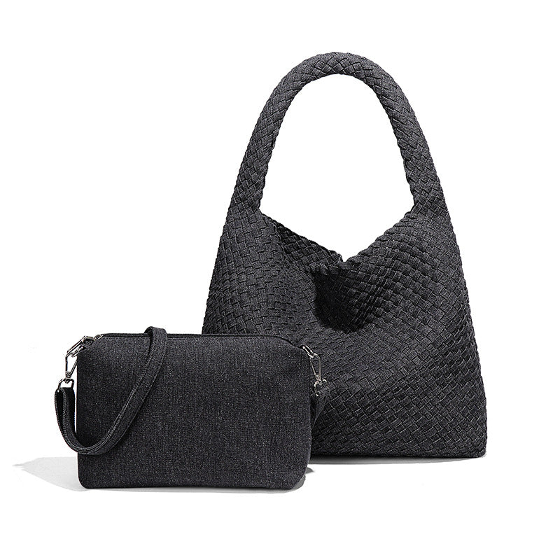 Two dark woven bags showcasing handmade craftsmanship for stylish fashion ملابس