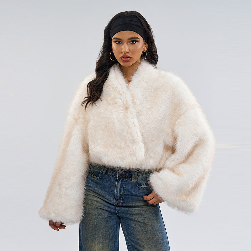 Woman wearing a fluffy white Fur Short Coat showcasing elegant langry fashion style with ملابس