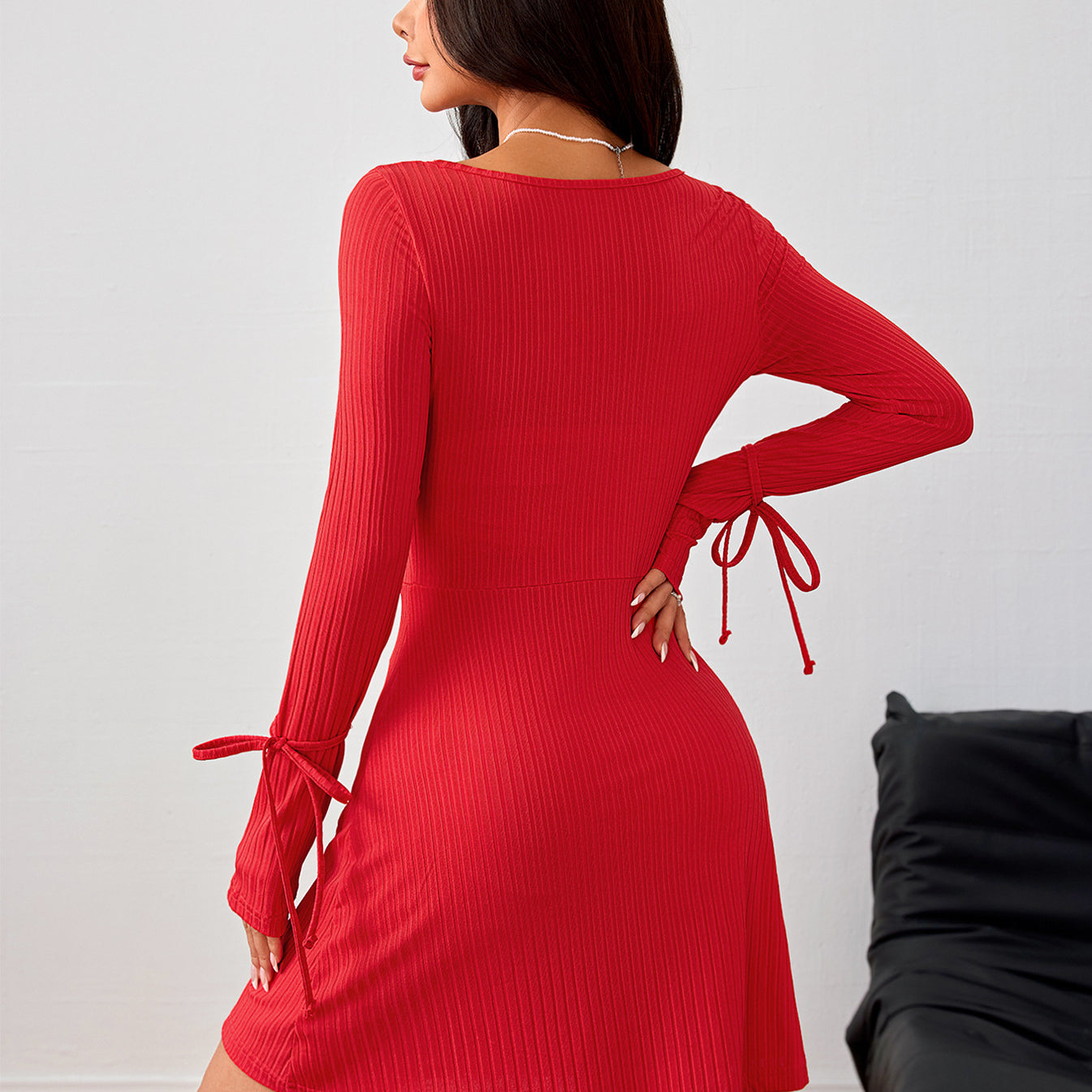 Red ribbed knit dress with tie details, perfect for trendy ملابس and fashion enthusiasts