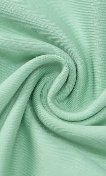 Mint green swirling pattern on backless slim fit jumpsuit