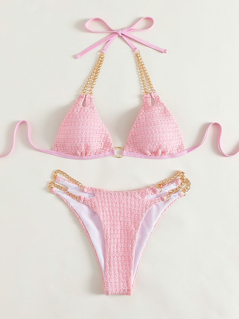Pink bikini with gold chain accents from the Backless Split Swimsuit collection