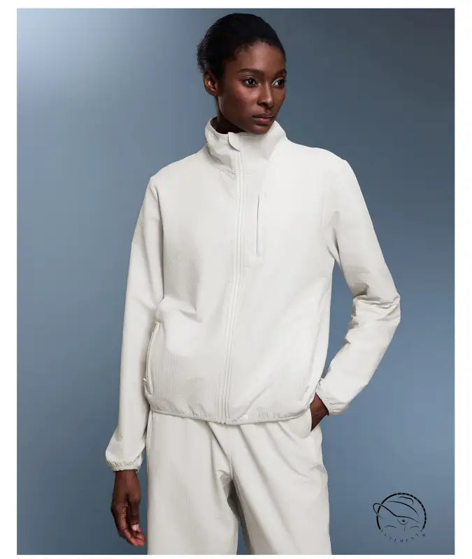 Langry white zip-up waterproof track jacket with ribbed cuffs for outdoor fashion