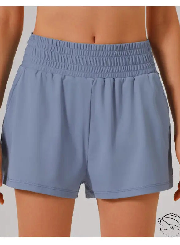 Light blue athletic shorts in loose sports yoga fitness set