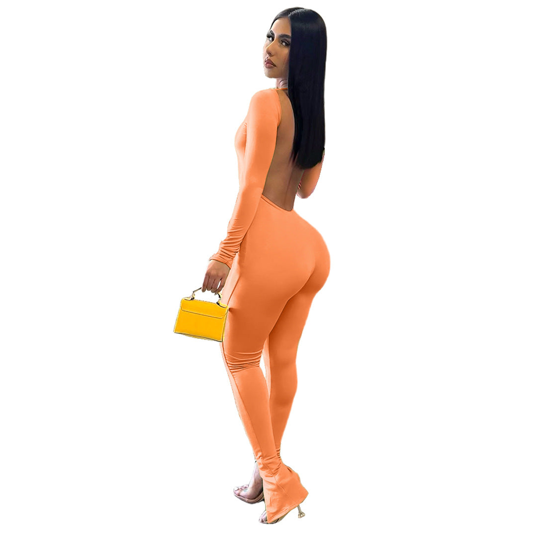 Elegant backless slit jumpsuit in vibrant orange with stylish design perfect for events
