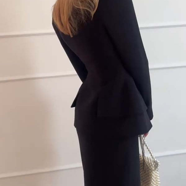 Black peplum suit featuring long sleeve design from the Langry fashion collection
