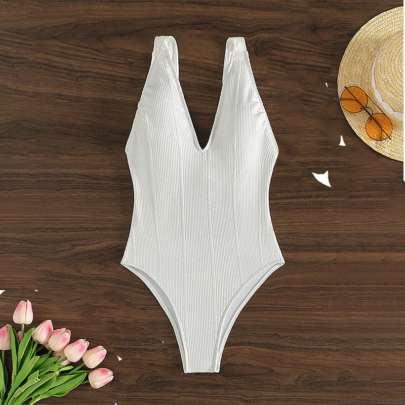 White ribbed one-piece swimsuit for women, designed for slimming beach exercises