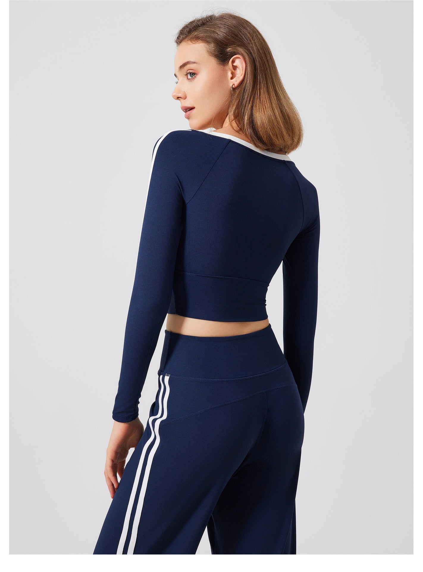 Navy blue athletic crop top and pants with white stripes, stylish sportswear for langry fashion