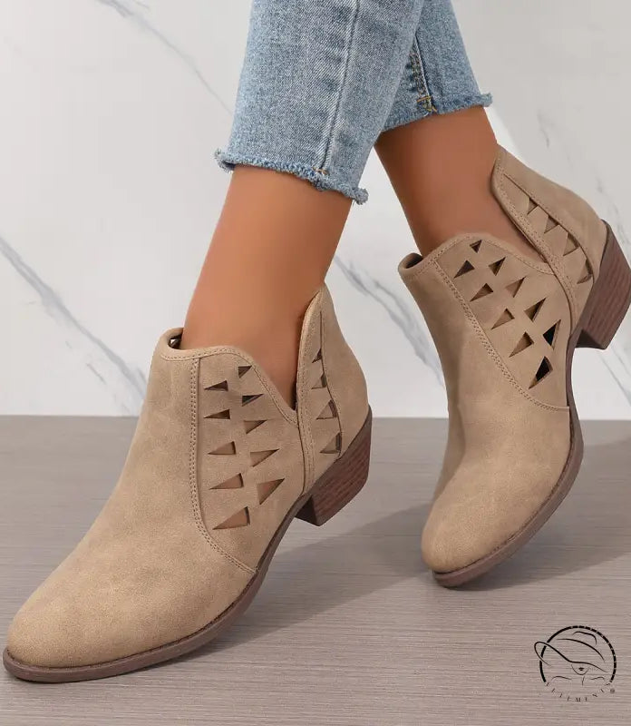 Beige suede daily ankle boots with triangular side cutouts