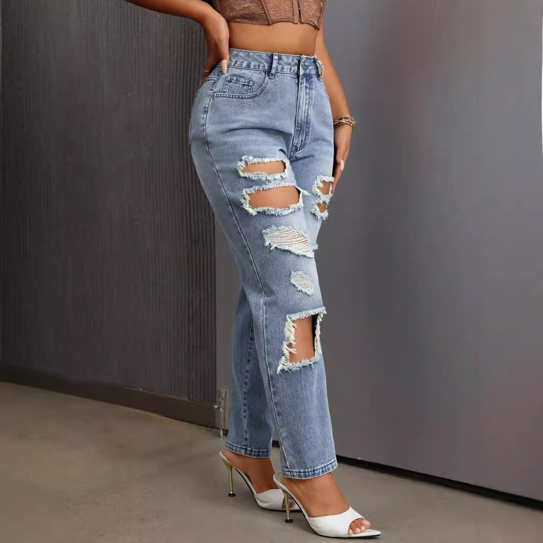 Light wash ripped women’s jeans from Slimming Skinny Ripped Jeans collection