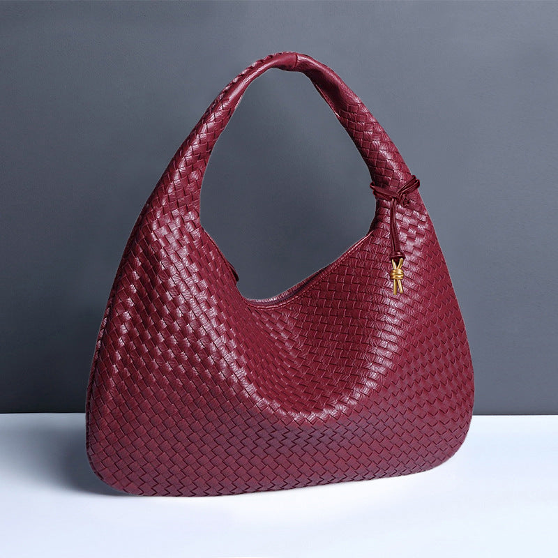 Burgundy woven leather hobo bag as a stylish addition to your casual fashion ملابس