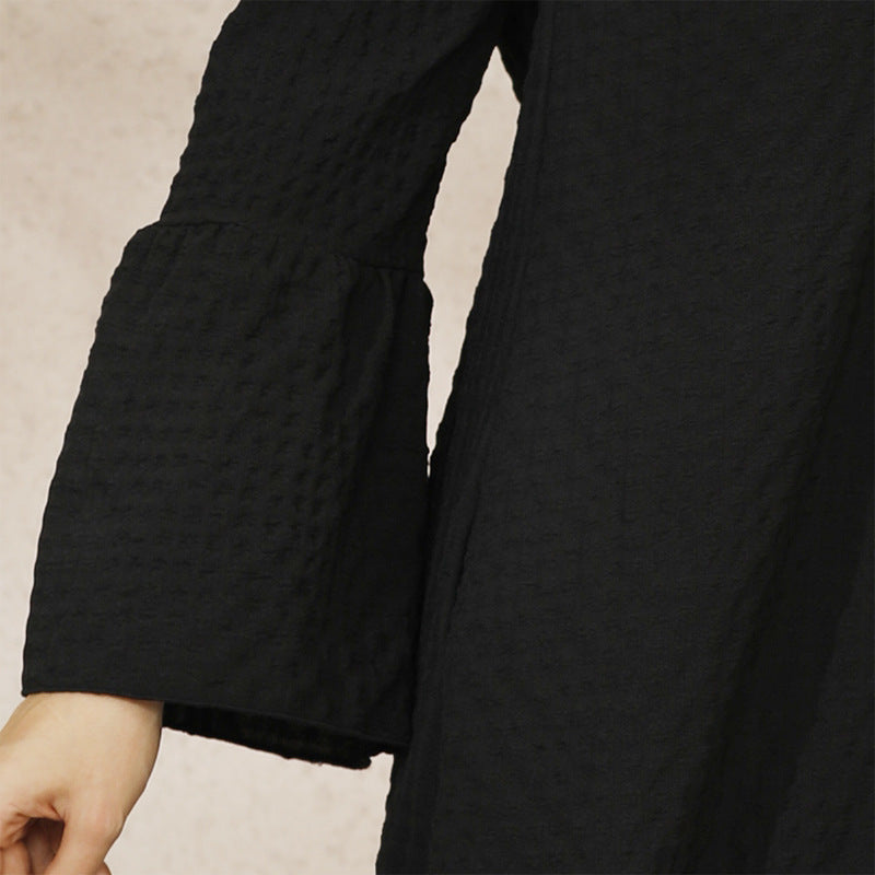 Black textured bell-sleeve robe dress with flared sleeves and elegant embroidery