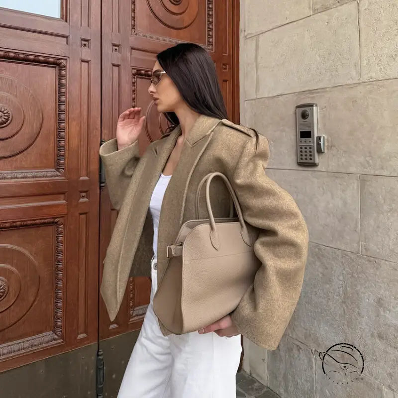 Beige large collared short coat with oversized bomber style