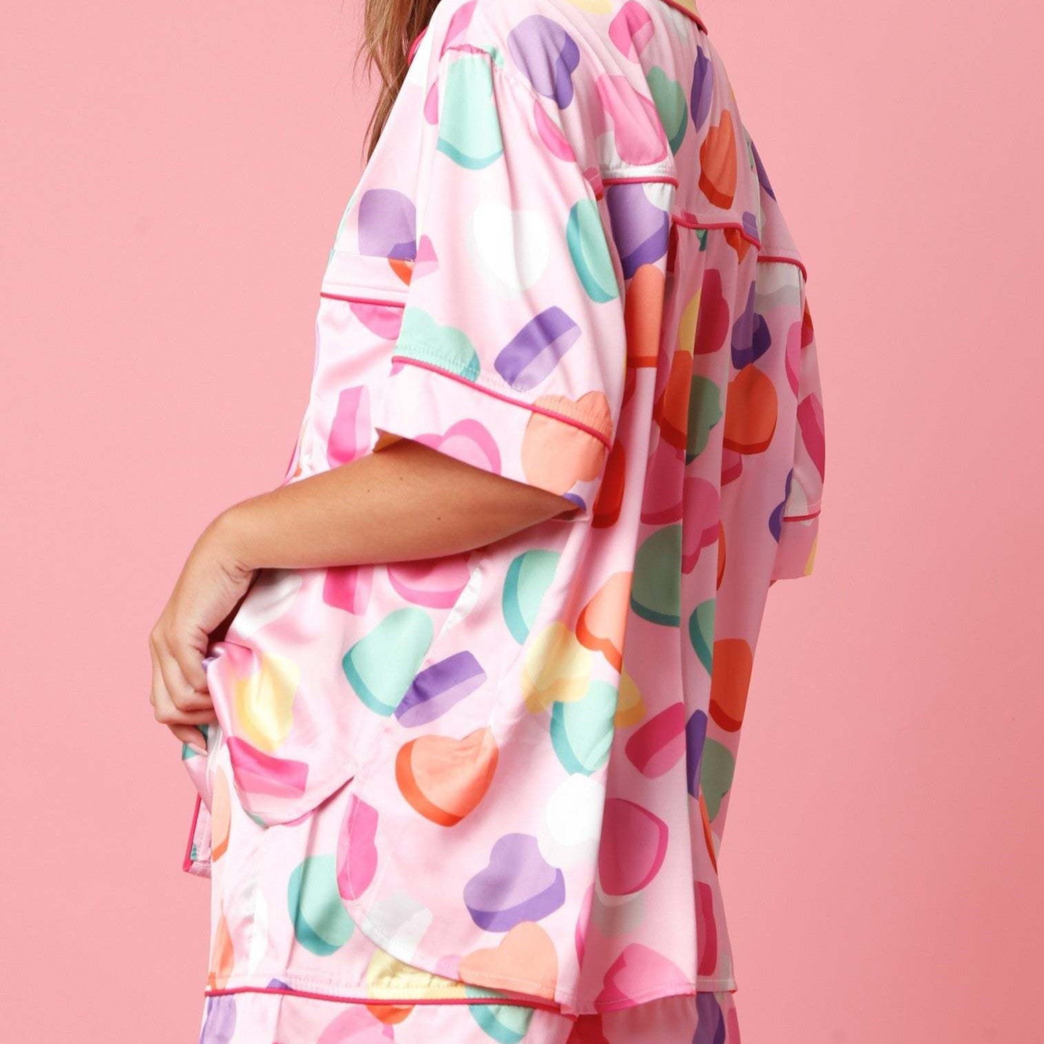 Pink cute two piece set pajamas with colorful candy hearts and red piping