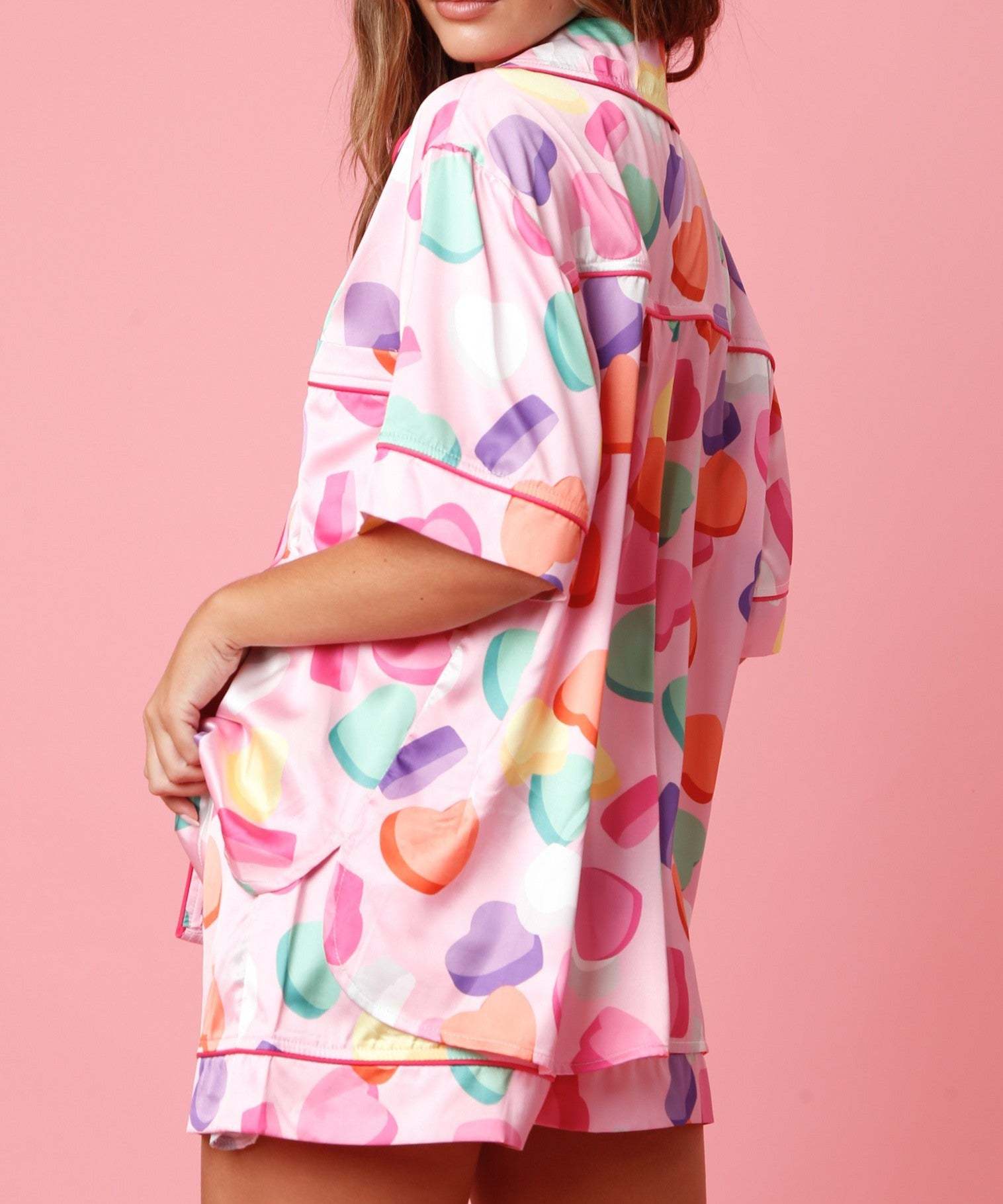 Pink cute two piece set pajamas with colorful candy hearts and red piping