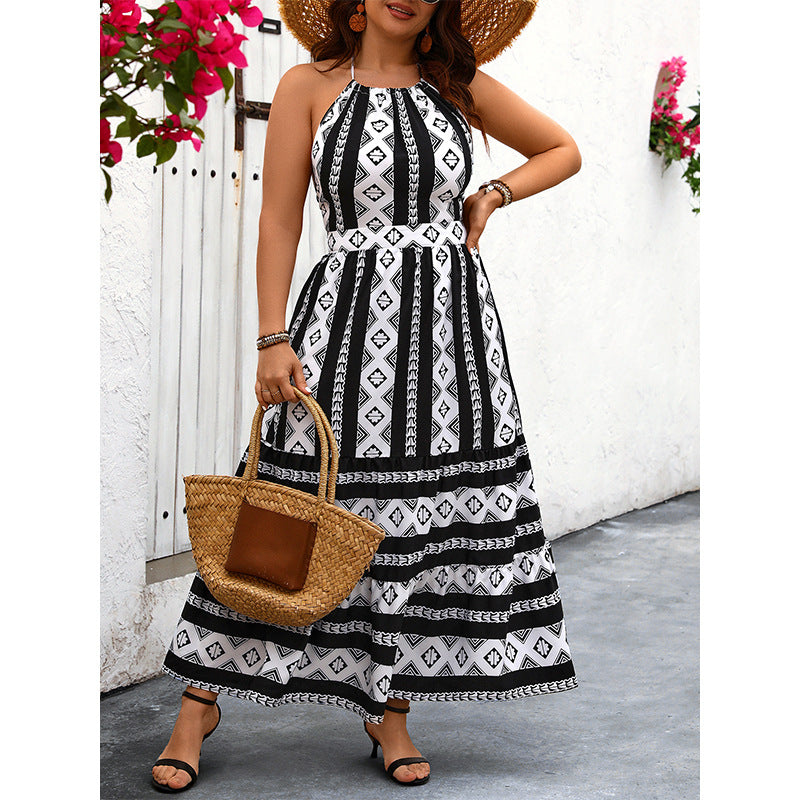 Black and white patterned halter maxi dress for a fashionable, langry vacation look