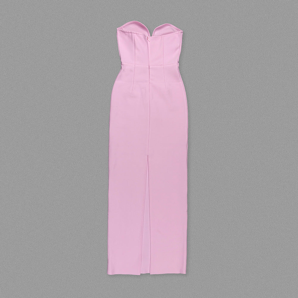 Strapless pink maxi dress with a chic slit, perfect for elegant evening fashion