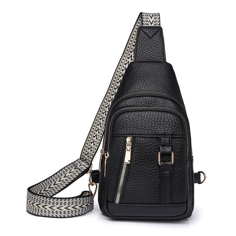 Elegant black faux leather sling bag with patterned strap for fashion and ملابس