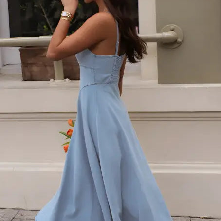 Light blue langry fashion dress with fitted bodice and midi skirt